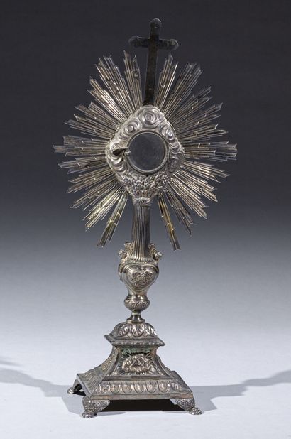 Silver monstrance, the bezel decorated with...