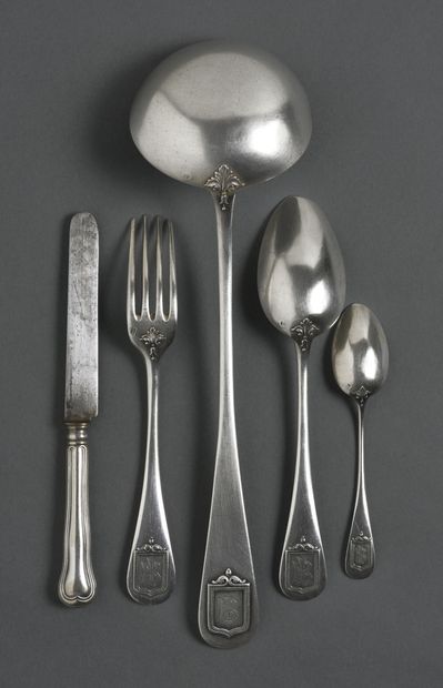 Part of a menagere in silver, spatula figured...