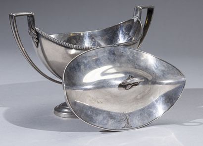 null Sauceboat covered in silver plated metal of navette form on pedestal with degrees,...