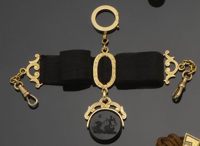 Elements of chatelaine, in 18K (750°/°°)...