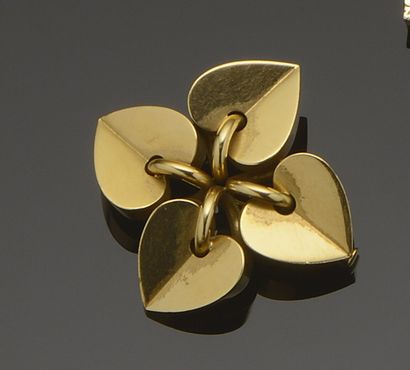 Brooch in 18K (750°/°°) yellow gold, composed...