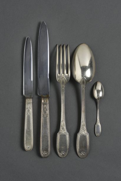 null Emile PUIFORCAT 
Part of a silver Empire style cutlery set, decorated with laurel...