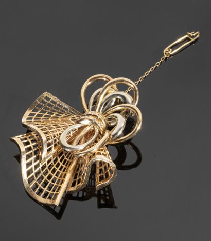 18K (750°/°°) yellow gold brooch with a fishnet...