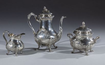 null Part of a silver tea service of baluster form decorated with two rocaille cartouches...