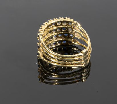 null Bague "De Harem" en or jaune 18K (750°/°°) composée de quatre anneaux indépendants...