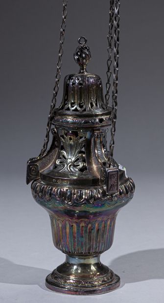 null Silver incense burner of baluster form, the pedestal with ovals, the body fluted...