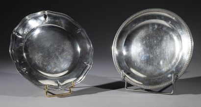 null Two small silver plates: 
Silver plate with palmettes molding on a striated...