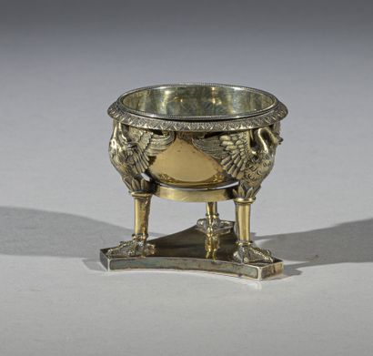 null Round saltcellar in vermeil, the hemispherical body with palmettes border, supported...