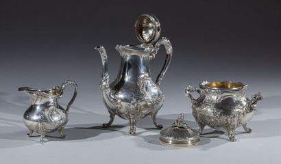 null Part of a silver tea service of baluster form decorated with two rocaille cartouches...