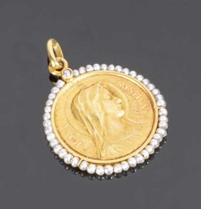 Religious medal in 18K (750°/°°) yellow gold,...
