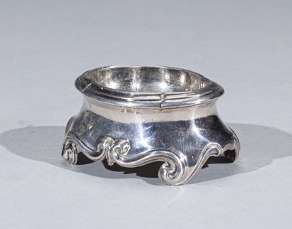 null Oval poly-lobed salt cellar in cast silver, the body with doucine, the base...
