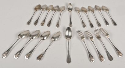 Set of four silver flatware, chased with...