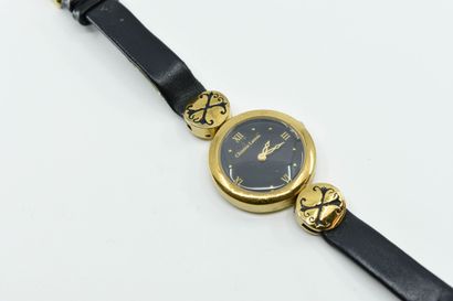 null CHRISTIAN LACROIX.
Watch with round dial, black background, gold ring, Roman...
