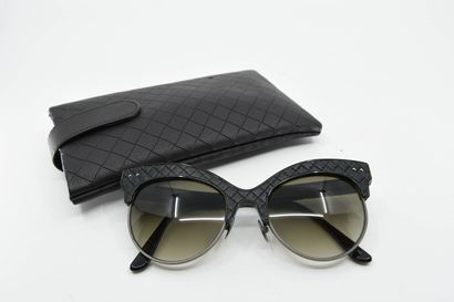 null BOTTEGA VENETA 
Pair of 1950's style sunglasses with smoked glasses set on the...
