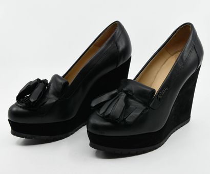 LONGCHAMP
Pair of black leather loafers with...