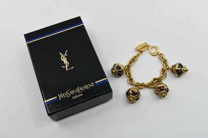 null YVES SAINT LAURENT 
Demi-parure composée d'un collier et d'un bracelet chaîne...