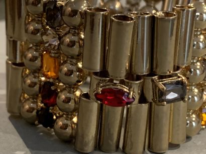 null BIMBA & LOLA
Bracelet articulé constitué d'éléments tubulaires en métal doré...