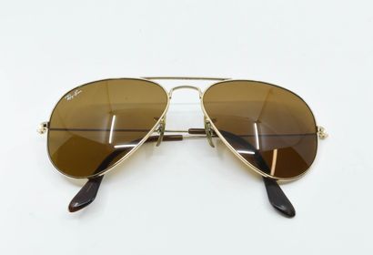 RAY BAN 
Pair of aviator sunglasses, brown-red...