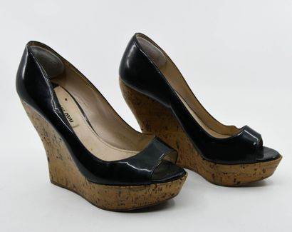 MIU MIU 
Pair of black patent leather open-toed...