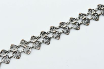 null Bracelet in silver filigree of hearts heightened by pink gold 18K (750°/°°)...