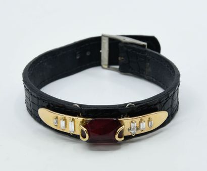 Leather bracelet set with an 18K (750°/°°)...
