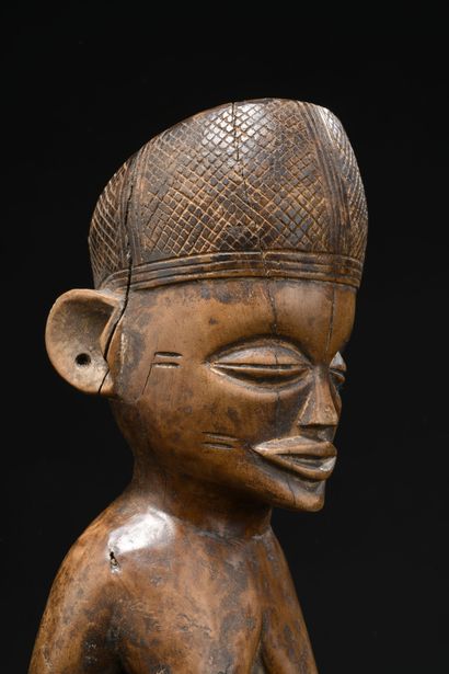 null Tshokwe/Lwena/ Iwele statuette, Democratic Republic of Congo/Angola
Wood
H....