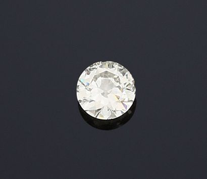 null Bague en or gris 18k (750 millièmes) sertie sur griffes d'un diamant rond taille...