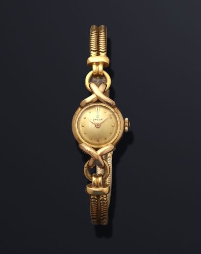 null OMEGA
Montre bracelet de dame en or jaune 14k (585 millièmes), la montre de...