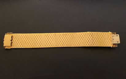 null Bracelet ruban en or jaune et or gris 18k (750 millièmes) formé de maillons...