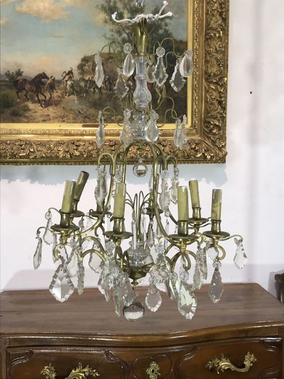 null Petit lustre cage en bronze à pampilles à huit lumières
Style Louis XV
XXème...