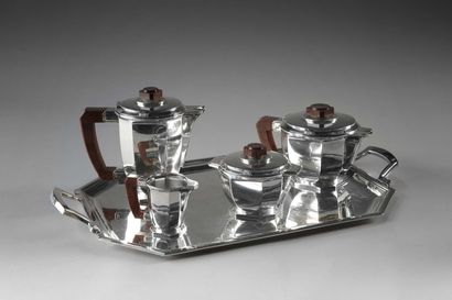null Ernest PROST (1923-1963)
Service à thé café en argent (800‰) à pans coupés comprenant...