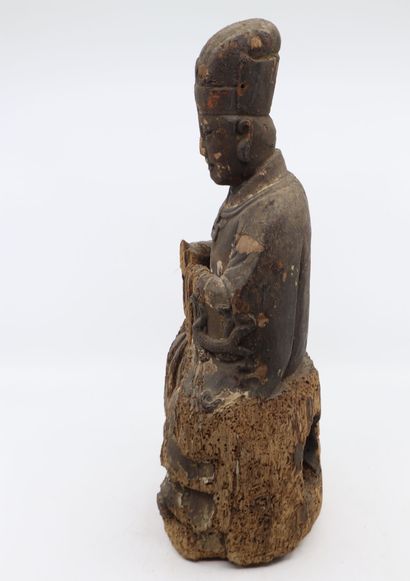 null Chine, XIXe siècle
Statuette en bois de fonctionnaire assis, portant sa large...