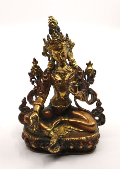 null Tibet, early 20th century
Statuette of green Tara in copper alloy, partly gilded,...