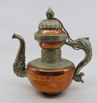null Tibet, late 19th/early 20th century
Copper and silver jug (low title) decorated...