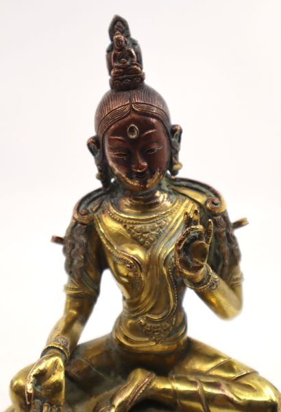 null Tibet, fin du XIXe siècle
Statuette de Tara verte en alliage de cuivre doré,...