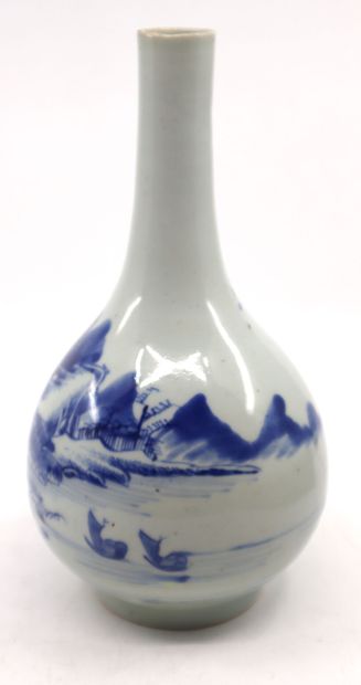 null China, 19th century
A blue-white porcelain piriform vase decorated with a lakeside...