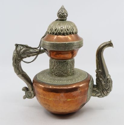 null Tibet, late 19th/early 20th century
Copper and silver jug (low title) decorated...