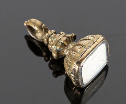 null Pendant - Charm (part of a chatelaine) in gilded metal, holding a milky agate...