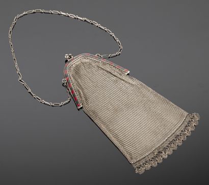 Evening bag forming a long purse in silver...