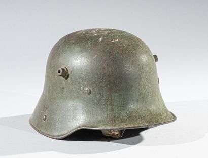 Germany
Helmet model 1916 in steel, pine...
