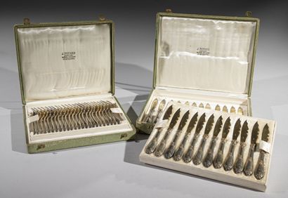 null Suite of twenty-four silver forks partially vermeiled and twenty-four knives...