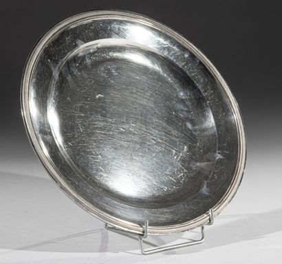 Large round silver dish with cord moulding,...