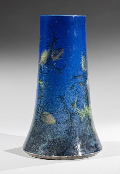 null Clément MASSIER (1845 - 1917) 
Curved tubular vase in polychrome enamelled earthenware...