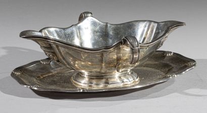 AUCOC
Oval sauceboat, with shells outline,...