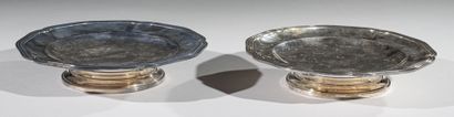 Pair of circular presentation plates on silver...