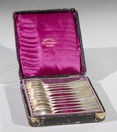 Twelve silver teaspoons, spatula with guilloche...