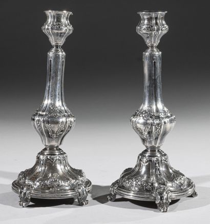 Pair of large silver candlesticks partially...