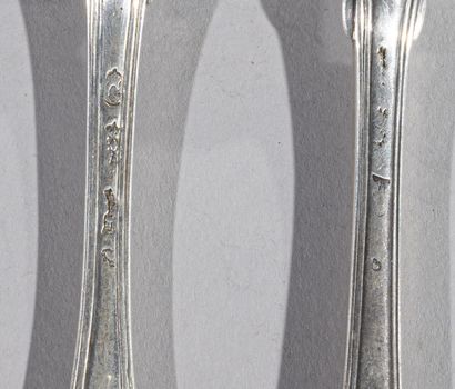 null Set of seven silver table settings, net pattern
Paris, 18th century 
We enclose...
