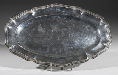 Oval silver dish with eight contours molded...
