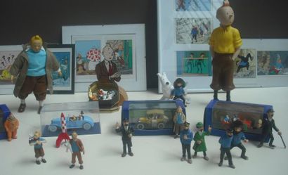 null Lot comprenant cinq voitures "Tintin", deux personnages Tintin (tête recollée)...